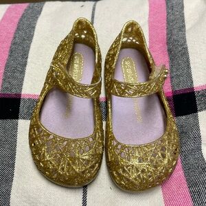 Mini Melissa gold shoes